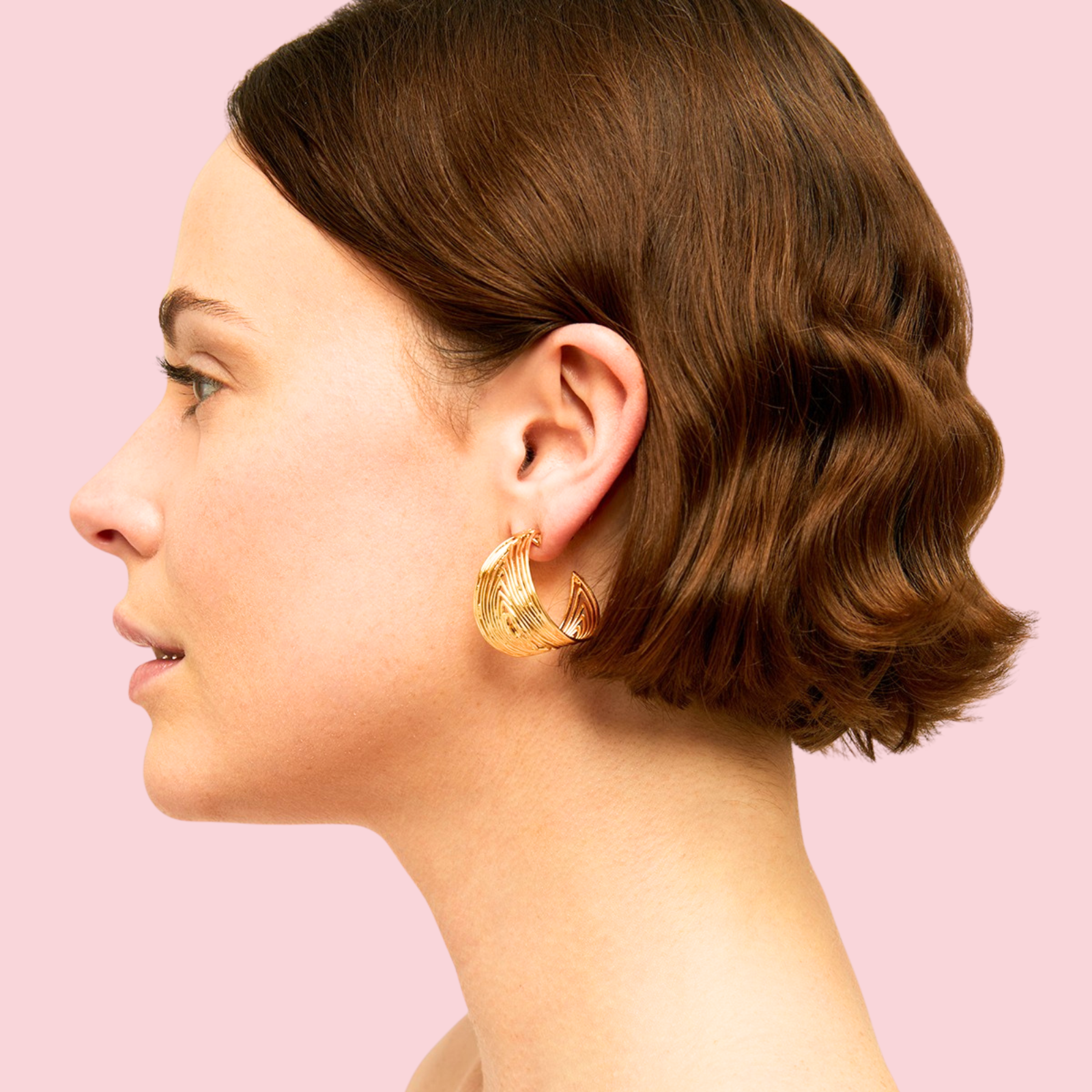 Wave hoop earrings gold
