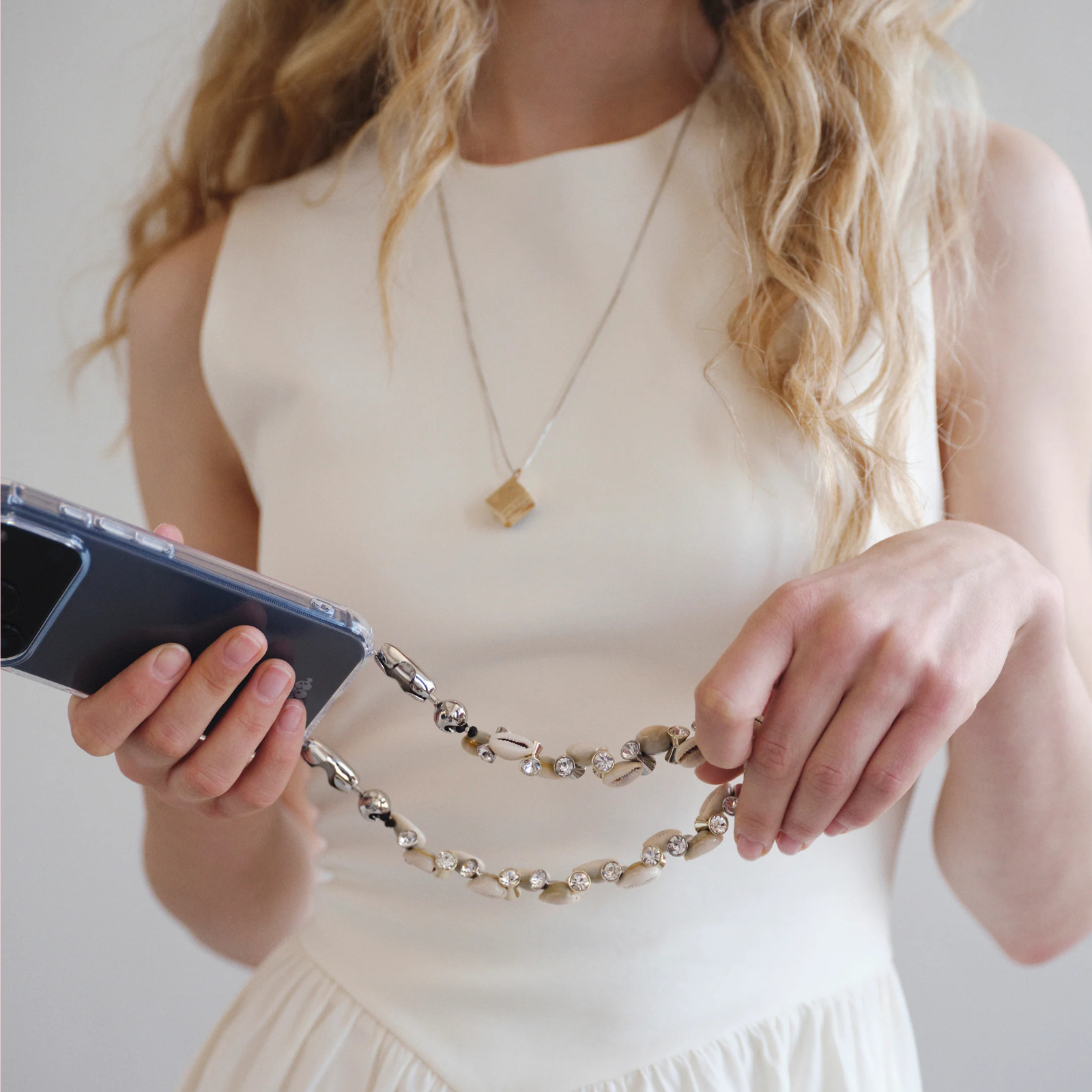 Bezel Shell Wristlet Cowrie